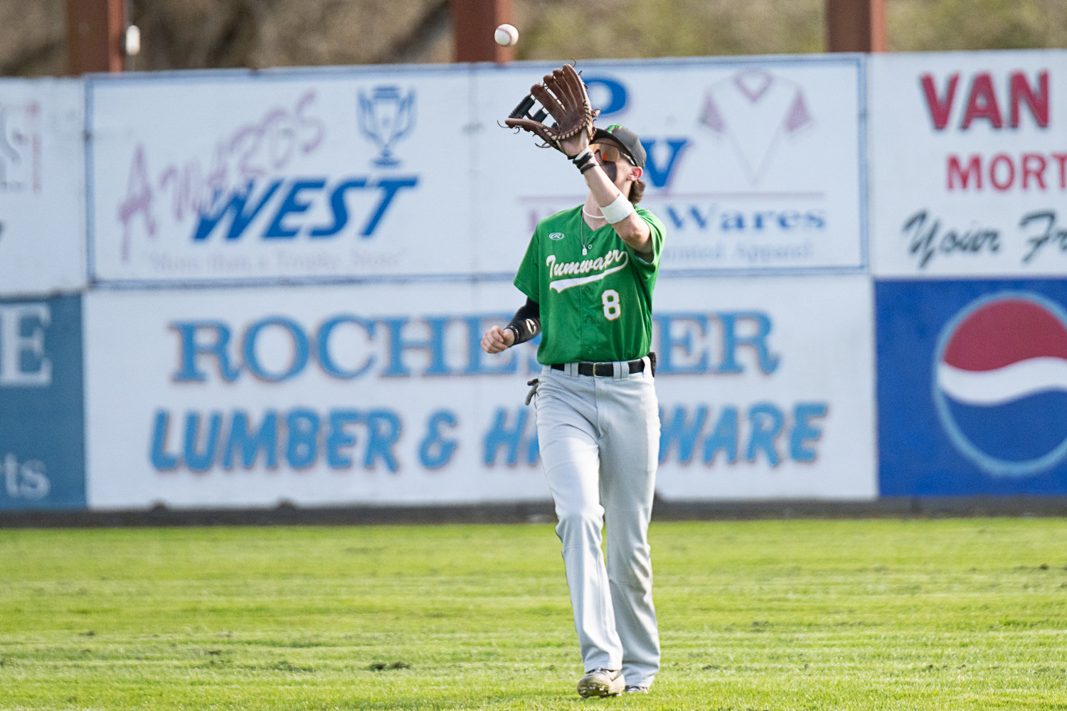 Nick Lowery sees in a fly ball during Tumwater's 10-0 win over Centralia on March 29.
