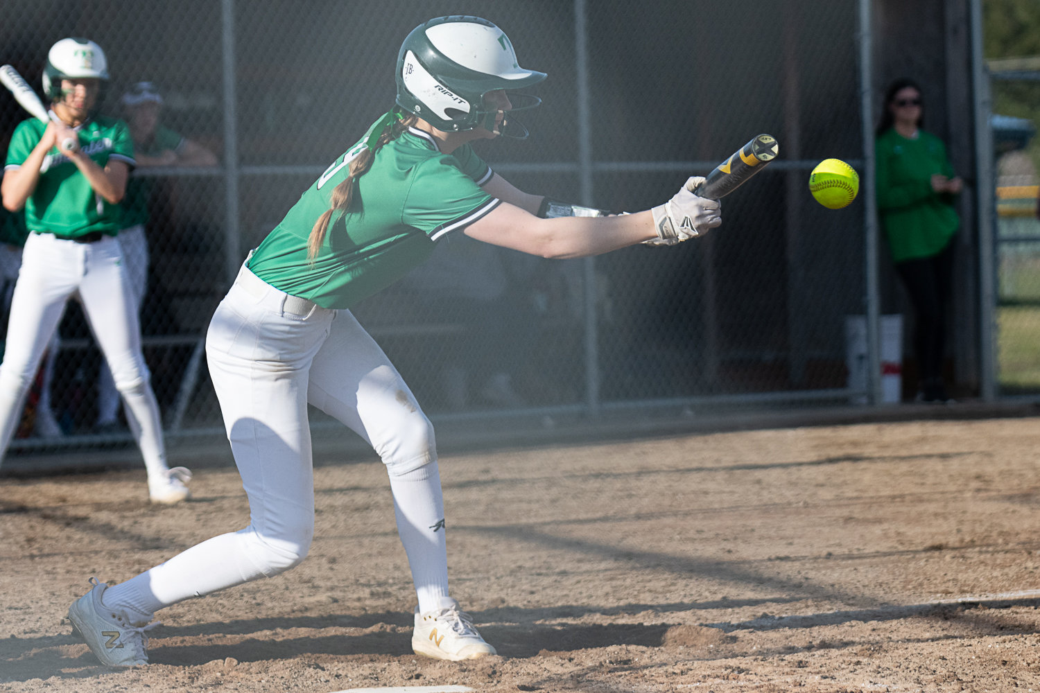 Erika Schock puts down a bunt to start a rally in the sixth inning of Tumwater's 5-3 win over Rochester on March 29.