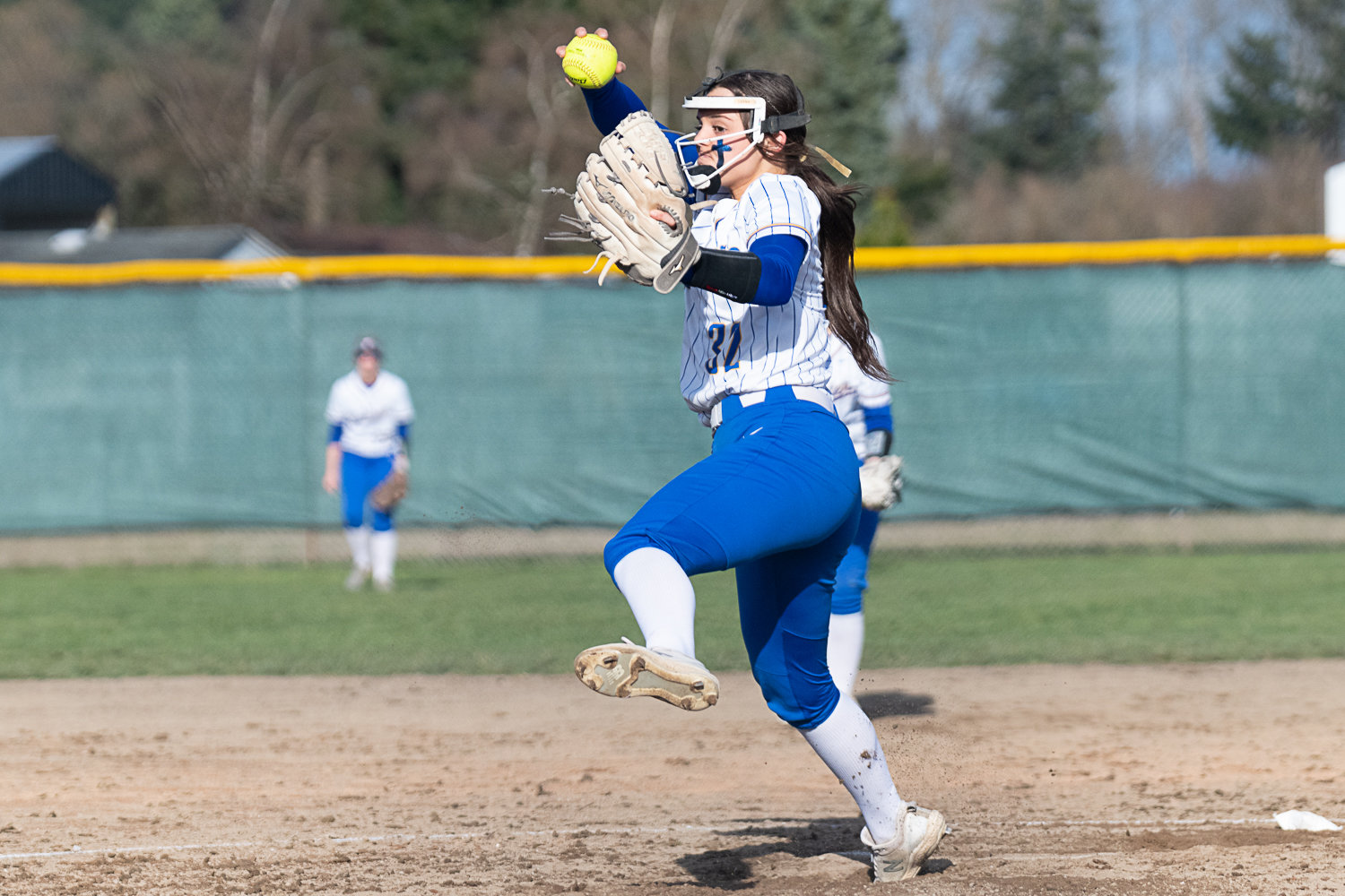 Layna Demers fires a pitch during Rochester's 5-3 loss to Tumwater on March 29.