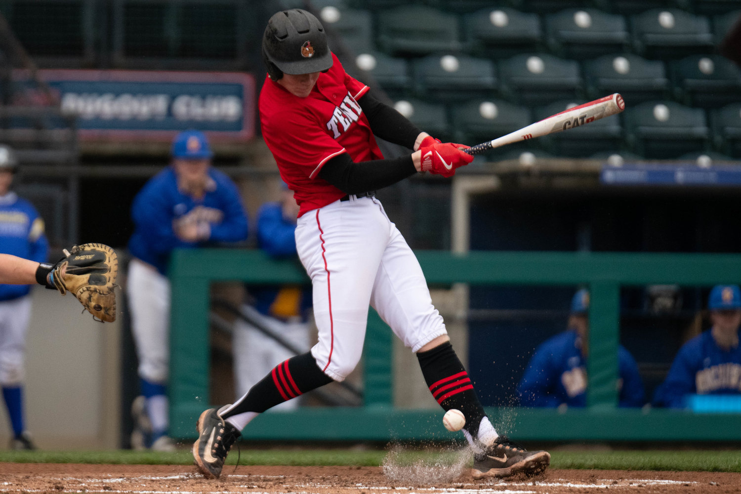 Austin Gonia chops an infield single in the first inning of Tenino's 11-7 loss to Rochester on April 1 at Cheney Stadium.
