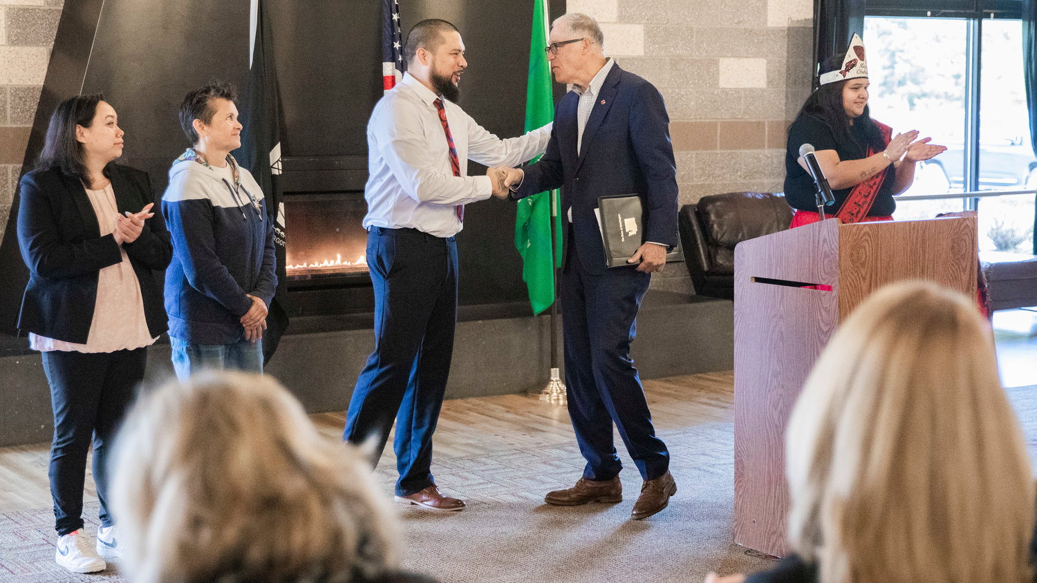 Chehalis Tribe Chairman Dustin Klatush shakes hands with Gov. Jay Inslee during a meeting discussing hydrogen power in Washington state Wednesday morning near Oakville.