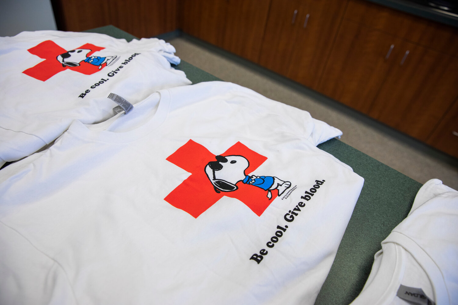Snoopy is featured on American Red Cross shirts given to those who donated blood at Cascade Community Healthcare in Centralia on Thursday, April 20, 2023.