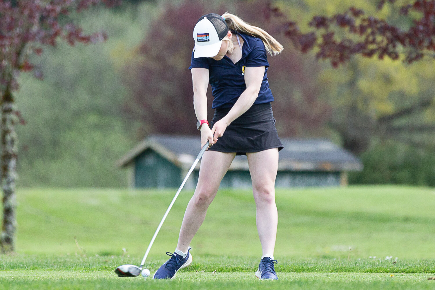 Aberdeen's Britt Rajcich tees off at Tumwater Valley Golf Course of the 2A EvCo Championships May 9.