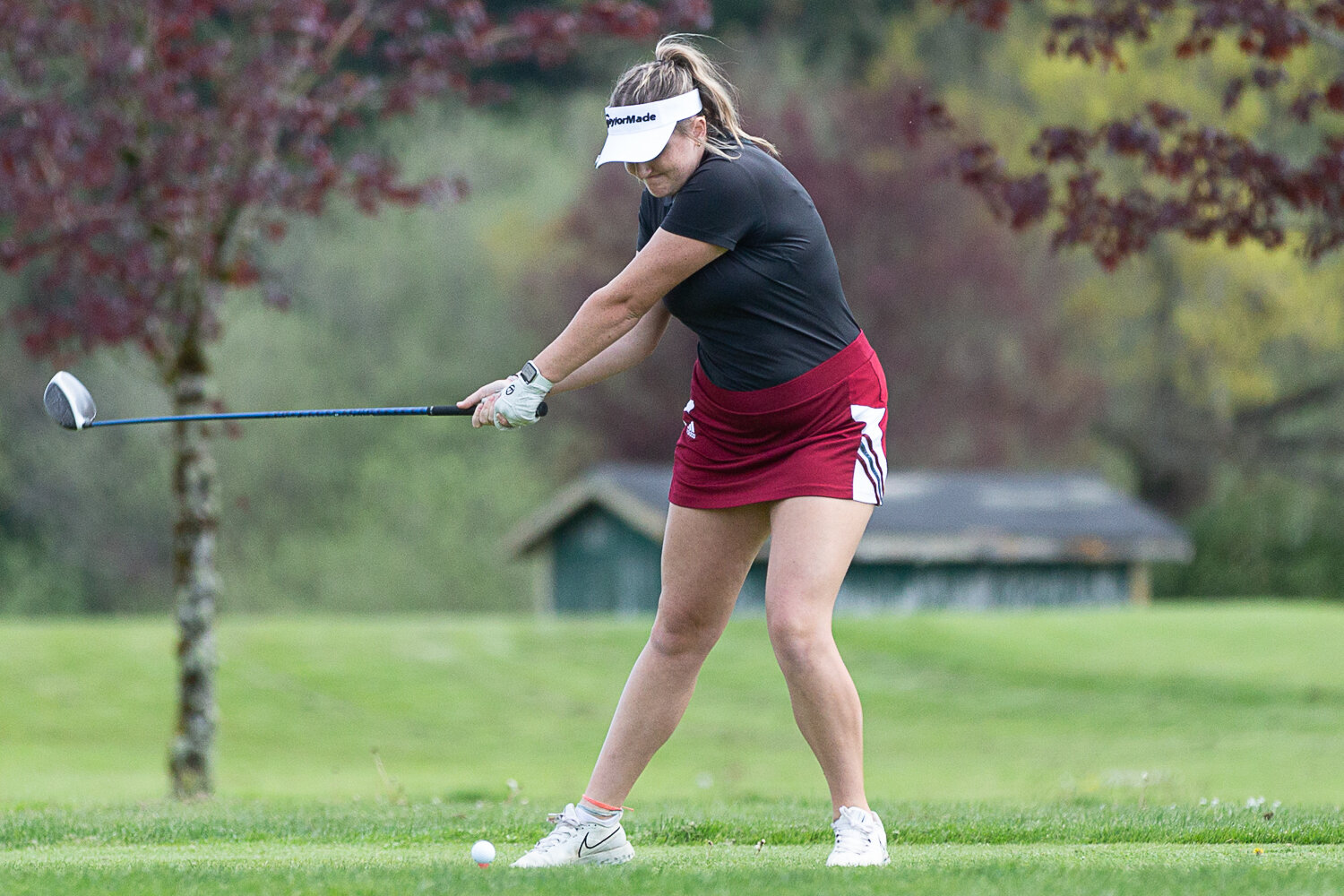 W.F. West's Natalie Eklund tees off at Tumwater Valley Golf Course May 9 in the 2A EvCo Championships on hole one.