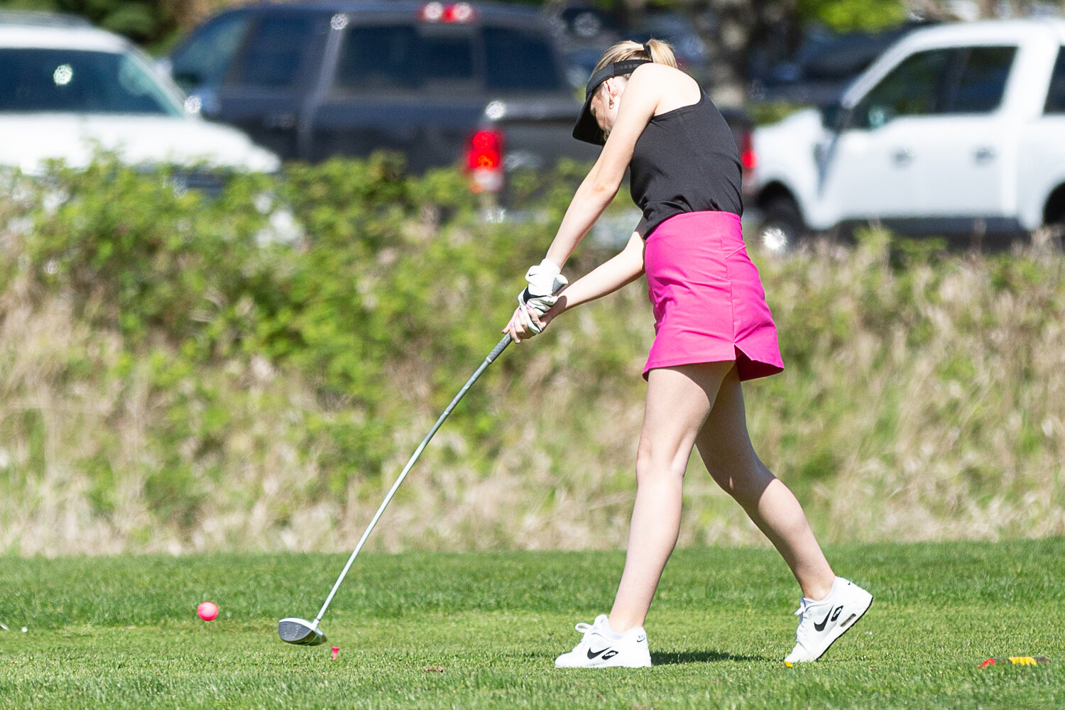 Rochester's Audrey Williams takes her first swing on hole one at Tumwater Valley Golf Course of the 2A EvCo Championships May 9.