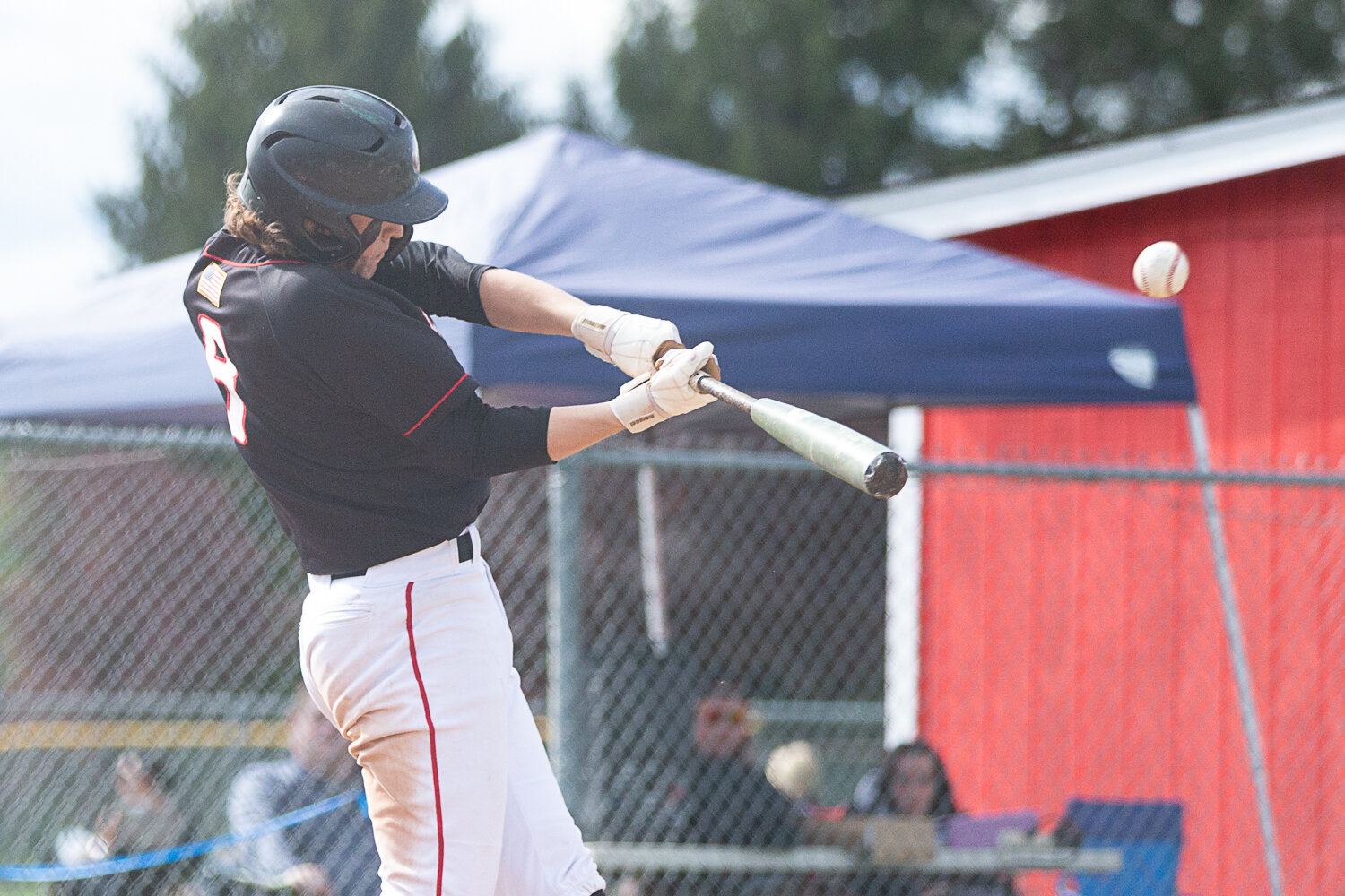 Tenino's Kellan Knox makes contact with a pitch against La Center in the 1A District 4 semifinals May 9 at Castle Rock.
