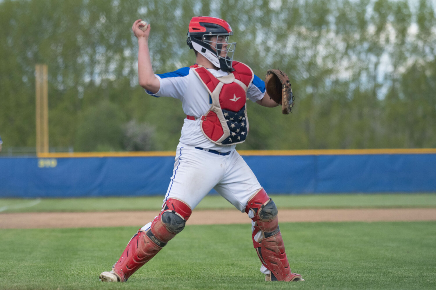 Sawyer Terry fields a bunt and throws to first during Adna's 15-5 loss to Toutle Lake in the 2B District 4 tournament semifinals, in Adna on May 9.