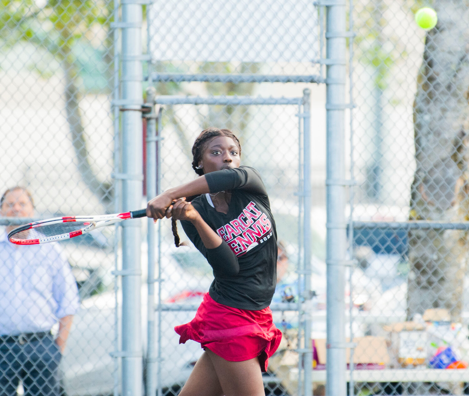 W.F. West first singles player Mariana Ceesay hits a backhand during the Evergeen Conference league championship match against Shelton’s Hannah Pratt on the Black Hills courts on Tuesday.