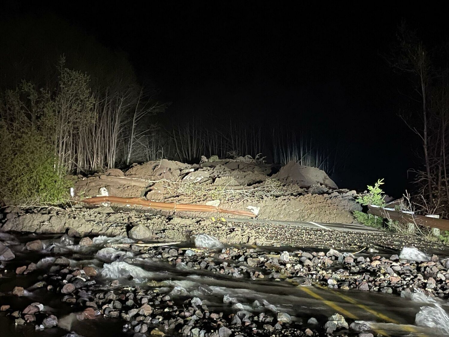 A debris slide blocked both directions of State Route 504/Spirit Lake Memorial Highway near Coldwater Lake on Sunday night.
