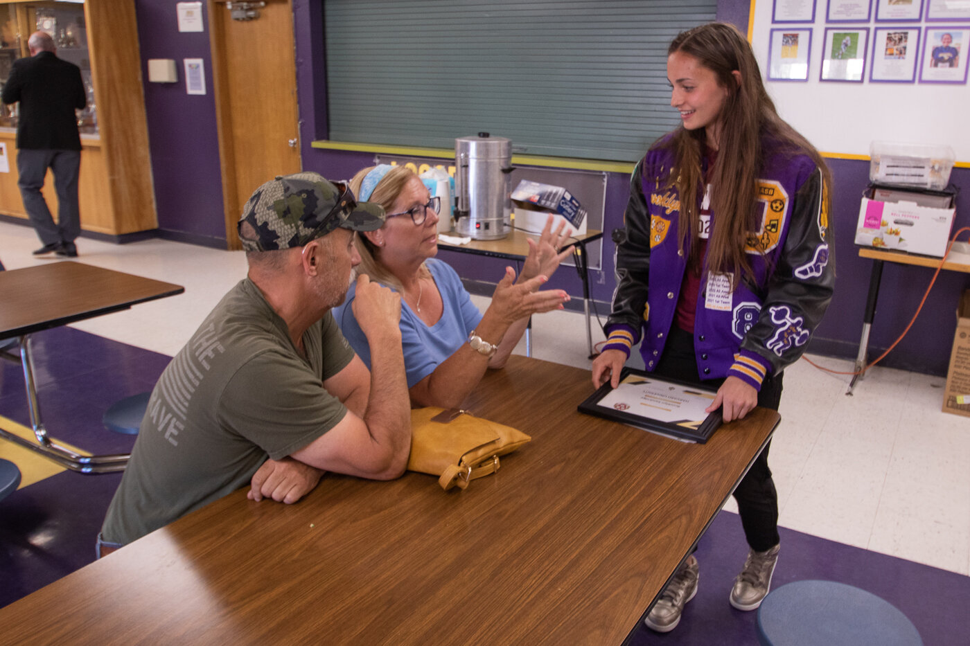 Following her congratulatory ceremony, Brooklyn Sandridge talks with friends Thursday afternoon as she is now preparing to move to Massachusetts to attend Harvard.