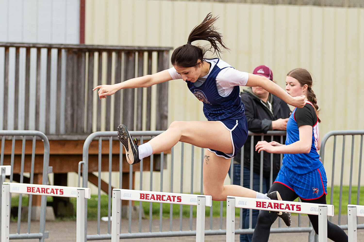 Pe Ell's Charlie Carper leaps over a hurdle in the 300-meter hurdles at the Chehalis Activators Classic April 22 at W.F. West.