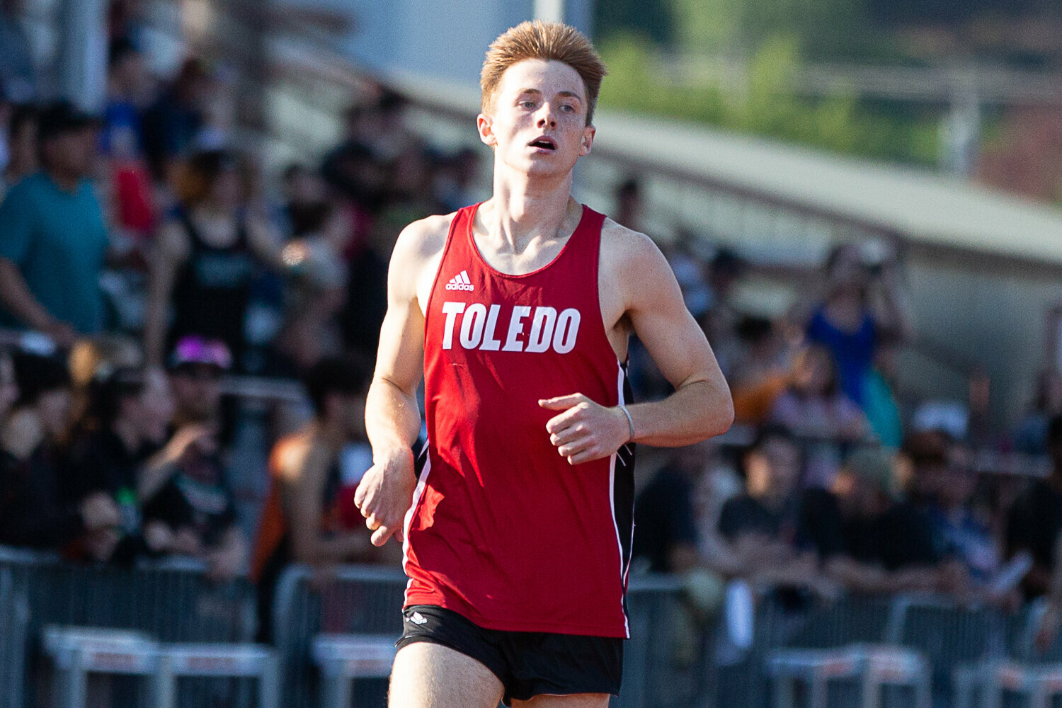 Toledo's Conner Olmstead crosses the finish line in the 400-meter dash May 19 at W.F. West in the 2B District 4 Championships.