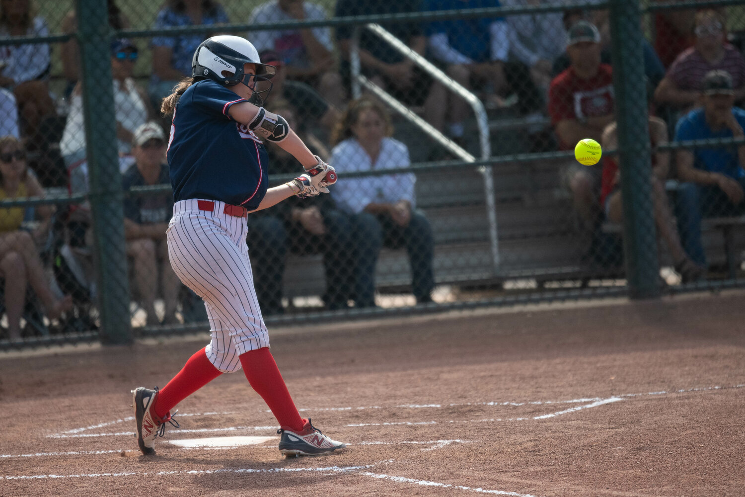 Lauren Matlock turns on a ball during the first inning of Pe Ell-Willapa Valley's loser-out game against Kittitas in the 2B state tournament, May 26 in Yakima.
