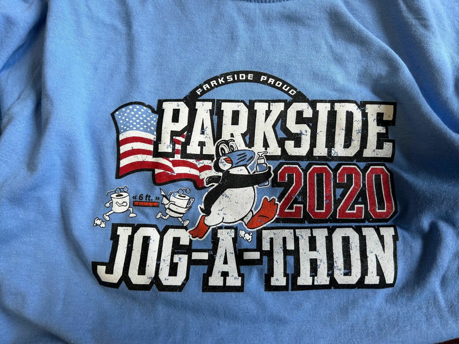 The T-shirt design Parkside Elementary School chose for its 2020 Jog-A-Thon, which was held remotely due to COVID-19 pandemic-related restrictions that were active at the time the event took place.