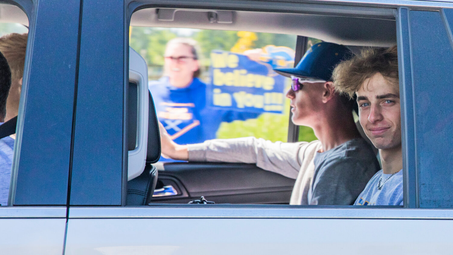 Adna High School baseball players smile at fans and family during a sendoff ceremony before state on Thursday, May 25.