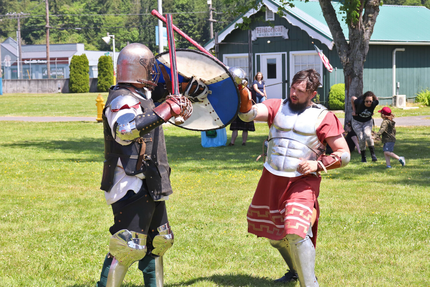 Live-action roleplayers “Palaminius” and “Alex” take part in a sword fighting demonstration on Saturday, May 27 during the Centralia Fantasy Festival at the Southwest Washington Fairgrounds in Chehalis.
