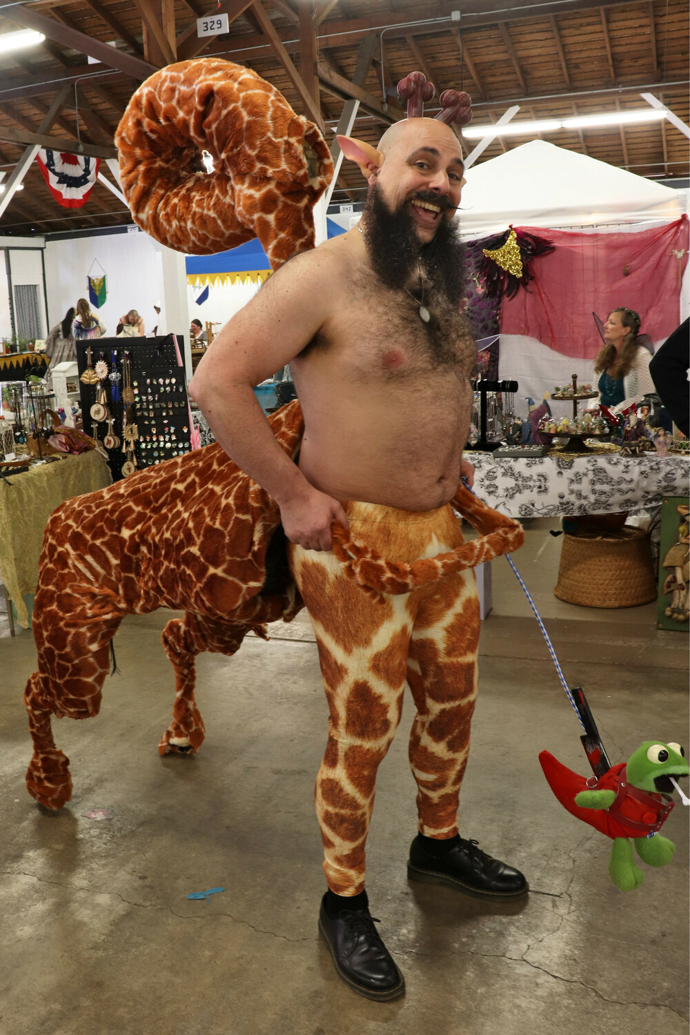 Ethan Siegel shows off his giraffe centaur costume during the Centralia Fantasy Festival at the Southwest Washington Fairgrounds in Chehalis on Saturday, May 27.