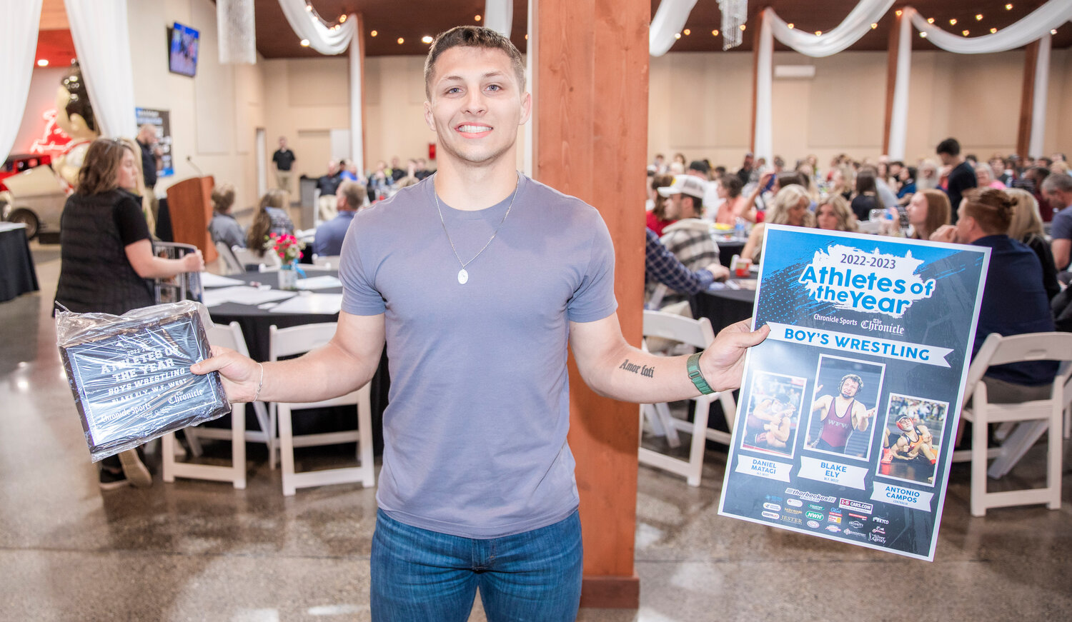 W.F. West’s wrestling MVP Blake Ely smiles for a photo Tuesday evening during the “Athletes of the Year” banquet at the Jester Auto Museum. Ely wrapped up his W.F. West career on the mat with a perfect 34-0 record, finishing things off with one last pin in the State title bout at 145 pounds.