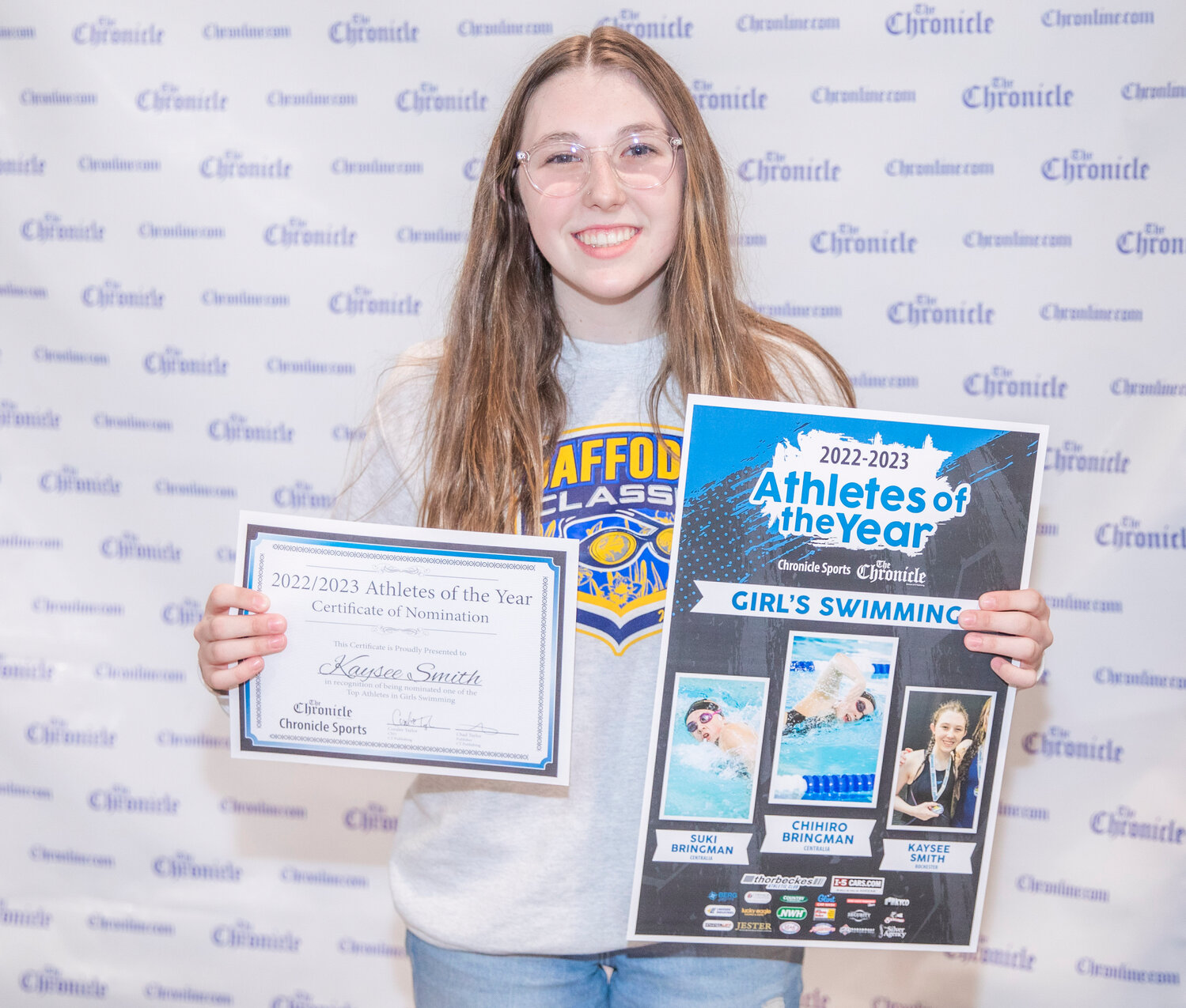 Rochester swimmer Kaysee Smith smiles for a photo Tuesday evening during the “Athletes of the Year” banquet at the Jester Auto Museum. One of the area’s top swimmers, Smith qualified for the State meet in two events with a strong showing at districts.