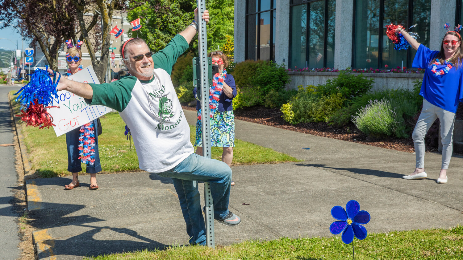 Chehalis Mayor Tony Ketchum prepares for the arrival of the Lewis County Special Olympics Law Enforcement Torch Run outside city hall Friday, June 2.