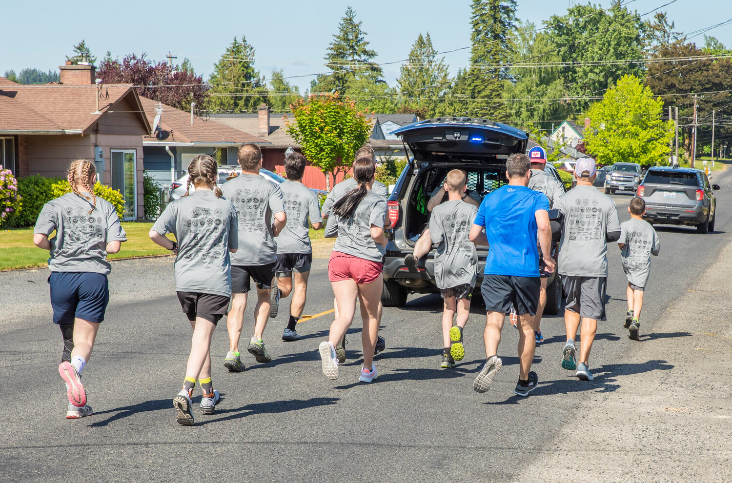 Centralia Police Sergeant Dave Clary, Commissioner Sean Swope, Royal Sons, State Rep. Peter Abbarno and his son Antonio ran the whole 19 miles during the Lewis County Special Olympics Law Enforcement Torch Run in downtown Chehalis on Friday, June 2.