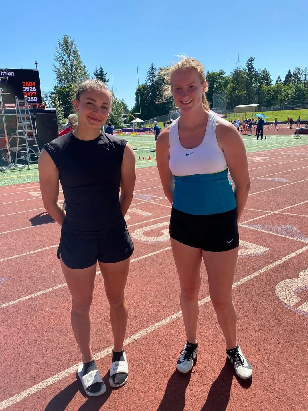 Onalaska's Brooklyn Sandridge (left) and Kelsi Haas (right) pose during the Washington State Combined Events Championship at Lake Stevens last weekend.