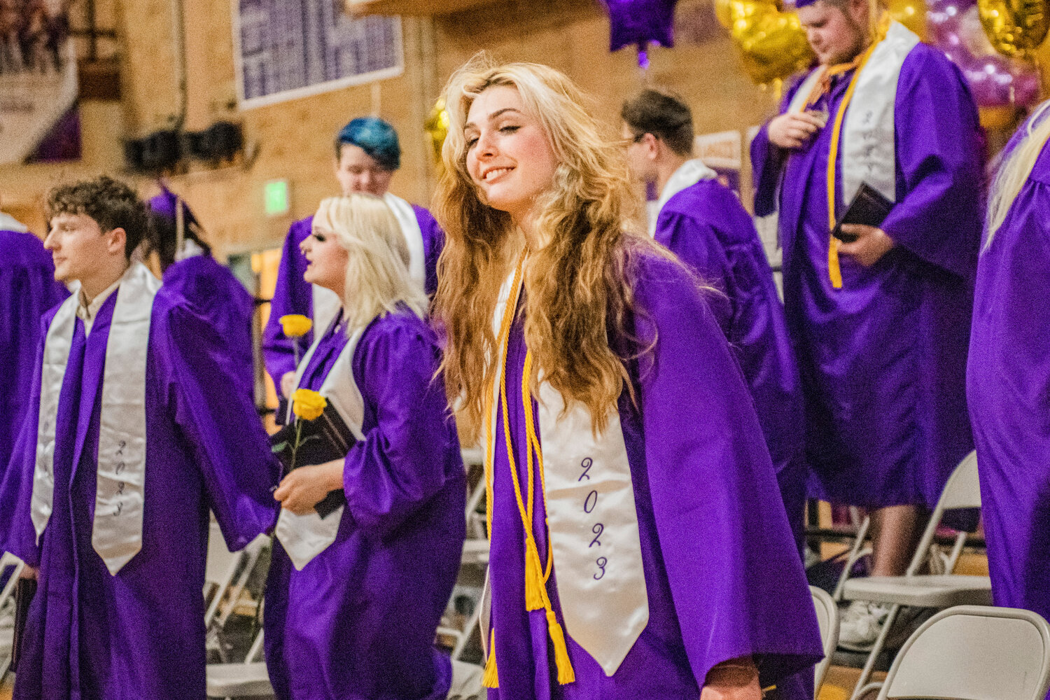 Keira Krenik smiles as she walks off the stage in the Onalaska High School gym after graduating on Friday night. Diploma in hand, Krenik joins Onalaska’s 100th graduating class. She marked her secondary career with high honors, earning a GPA between 3.5 and 3.99.