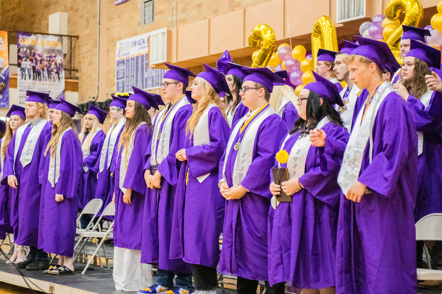 In the Loggers’ gym on Friday night, Onalaska High School’s 100th graduating class of seniors prepares to turn their tassels and leave with their diplomas.