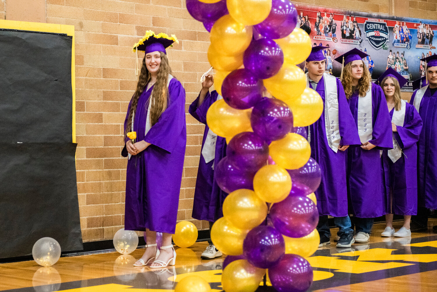 Onalaska High School Class senior Aurora Ray Sweazy prepares to lead the Class of 2023 down the center of the gym to graduate on Friday night. Sweazy was recognized as one of just a few Onalaska seniors who attended Running Start in school. She graduated with honors.