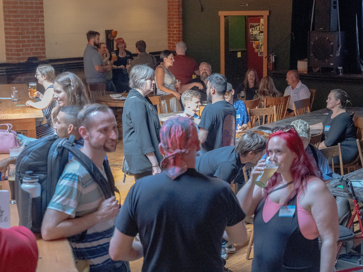 Attendees mingle at the Lewis County Young Professionals Kickoff Mixer at The Juice Box in Centralia Thursday evening, June 6, 2023.
