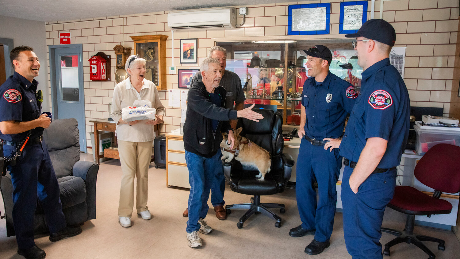 Scott Olson, 67, of Centralia, smiles while thanking Riverside firefighters for the work they do Wednesday morning. A defibrillator and a CPR machine were used to stabilize Olson’s heart last April. Riverside Fire Authority predicts that survivability has risen about 15% since the implementation of the CPR machine on their calls.