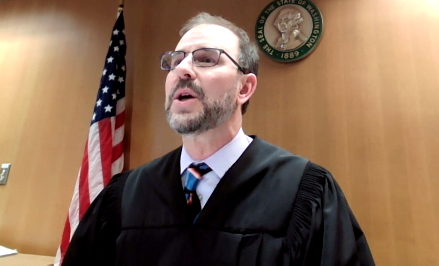 Thurston County Superior Court Judge John Skidner addresses the murder case against Jason Butterton, 38, of Chehalis, in Thurston County Superior Court on Thursday, July 20. Butterton declined to appear at his hearing, citing illness.