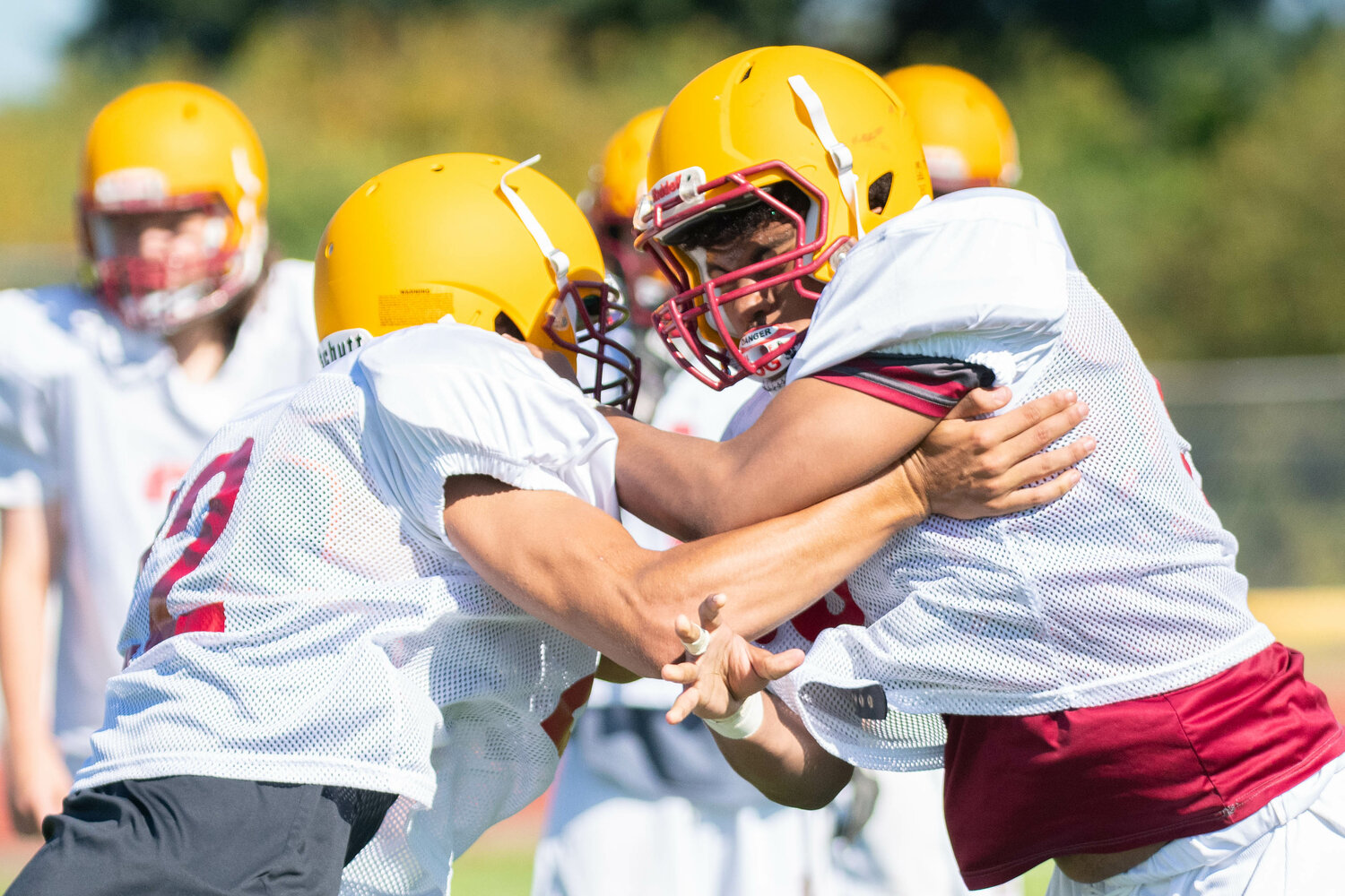 Lincoln Ruiz (left) takes on Fortune Solonio (right) in a one-on-one drill at Winlock's practice on Aug. 19.