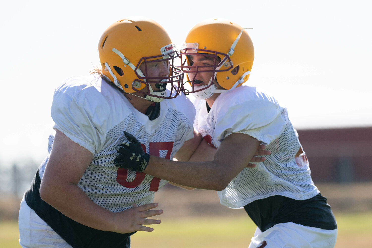 Lincoln Ruiz (right) tries to block Christian Uhri (left) during a one-on-one drill at Winlock's Aug. 19 practice.