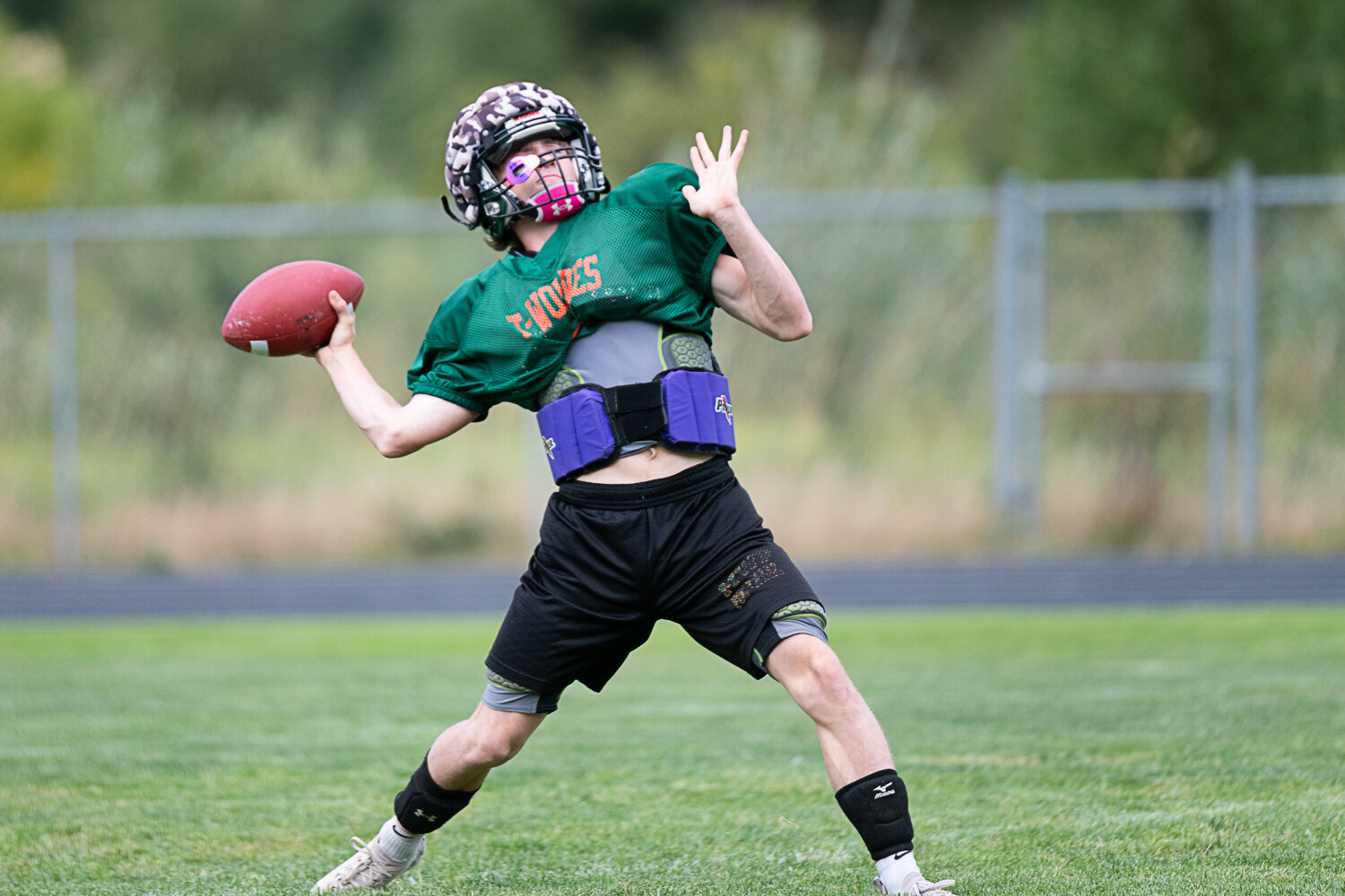 Judah Kelly throws a deep ball during Morton-White Pass' practice on Tuesday, Aug. 22, in Morton.