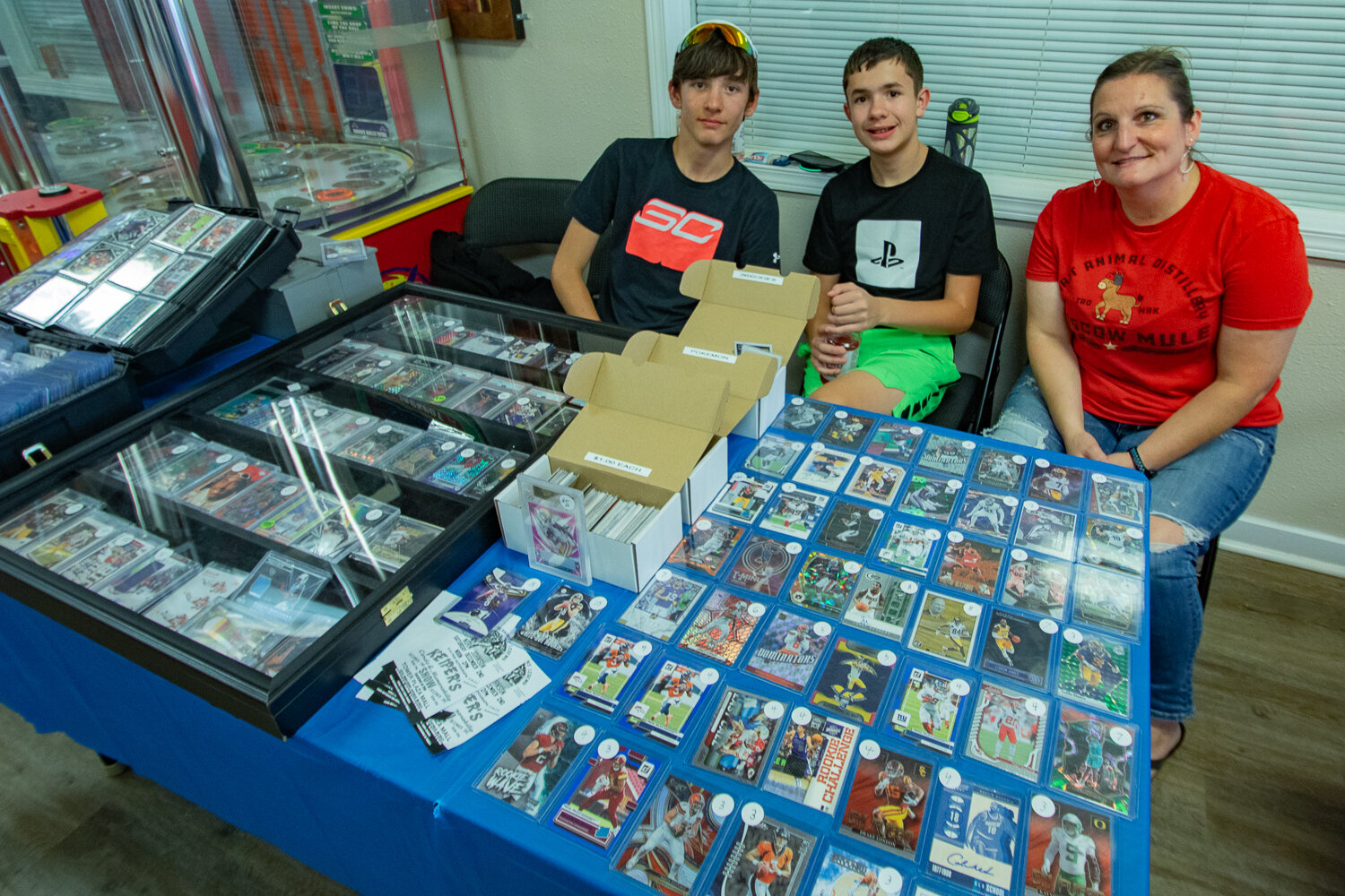 Visitors browse vendors' selections of sports and trading cards, sports memorabilia and other collectibles at the first Keiper's Card and Memorabilia Show on Saturday, Sept. 2 inside the Tower Plaza Mall at 320 N. Tower Ave. in Centralia.