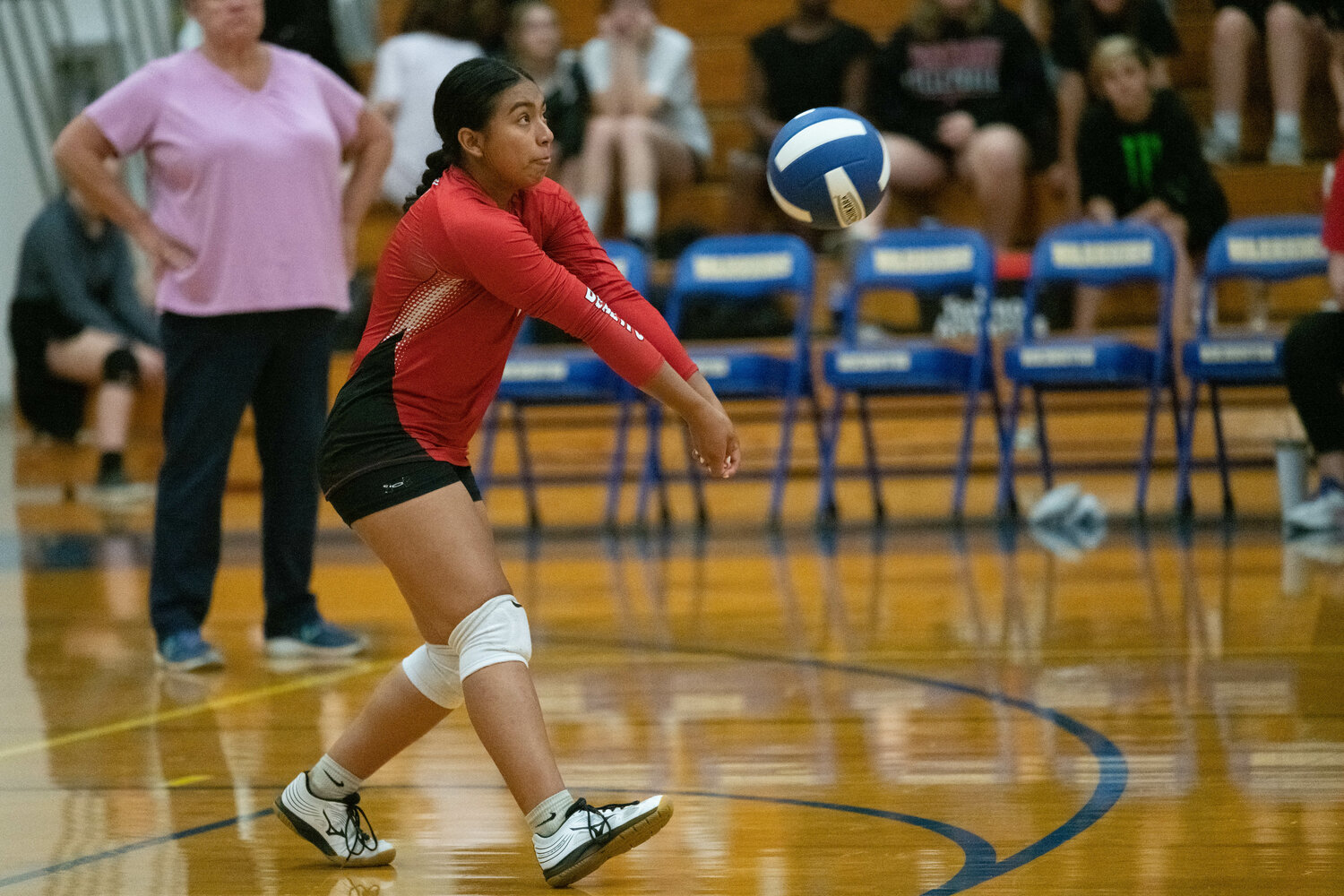 Natalie Davis digs a ball up during Tenino's three-set win at Rochester on Sept. 18.