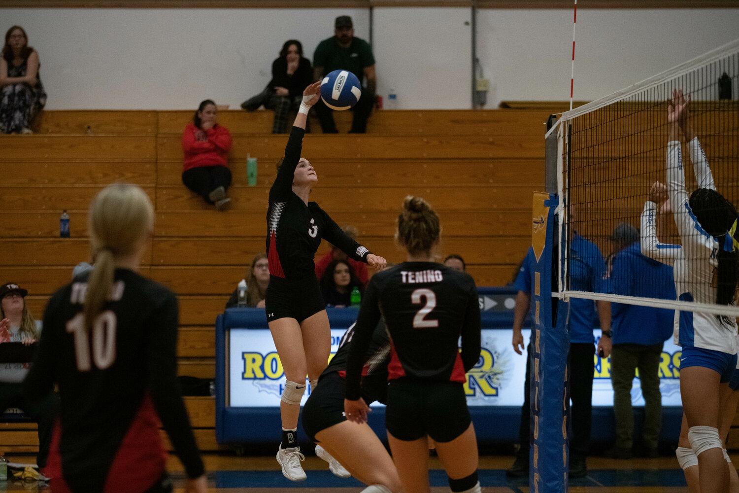 Brooke Bratton spikes the ball during Tenino's three-set win at Rochester on Sept. 18.
