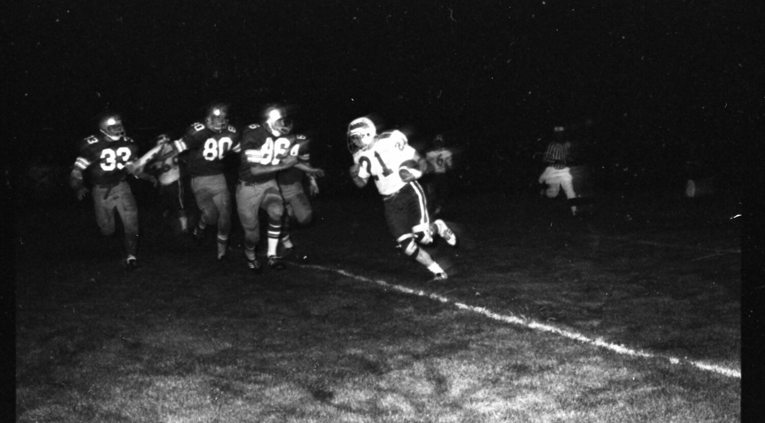 Chehalis defenders chase down an Elma ballcarrier during the Bearcats' win over the Eagles on Sept. 21, 1973.
