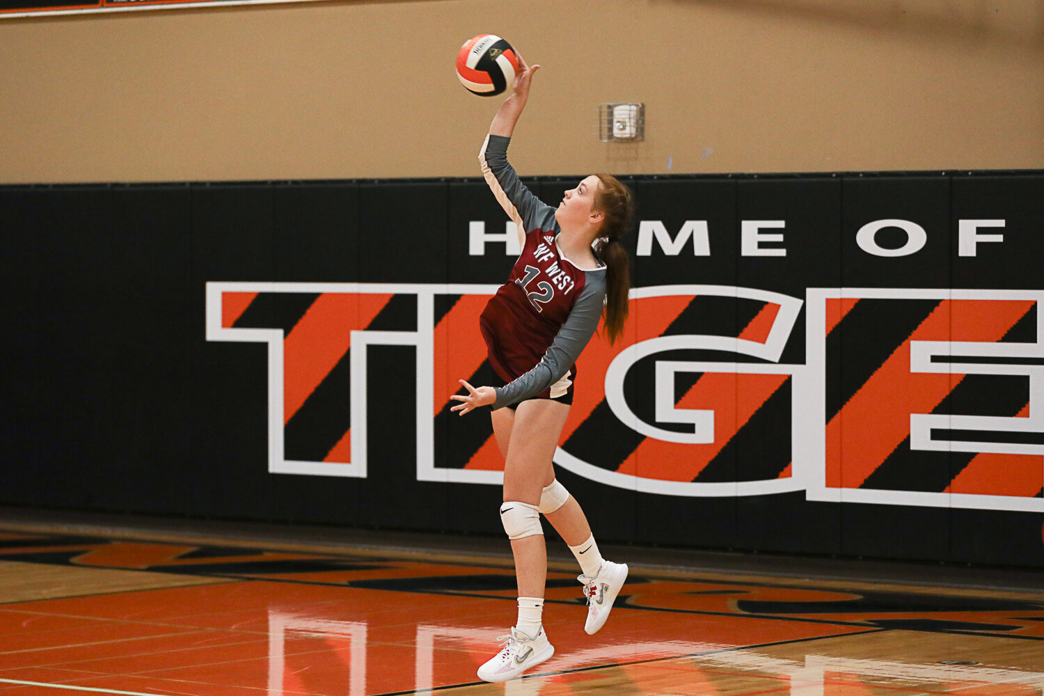 Addison Adams fires off a serve during the first set of W.F. West's three-set loss at Centralia on Sept. 21.