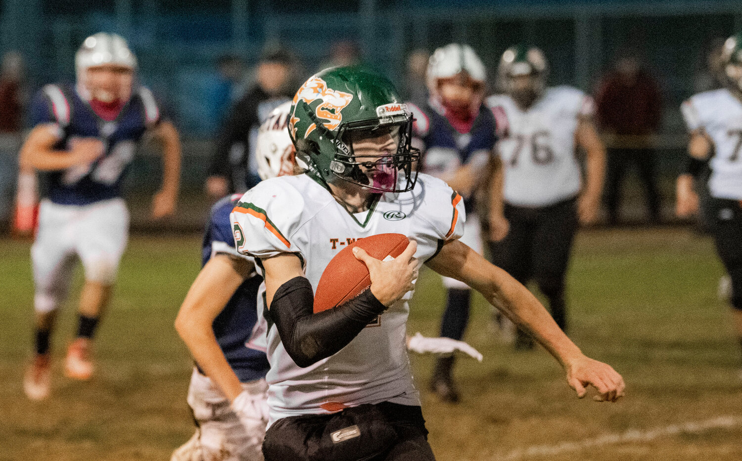 Morton-White Pass quarterback Judah Kelly takes the ball down the field in Pe Ell on Friday night.