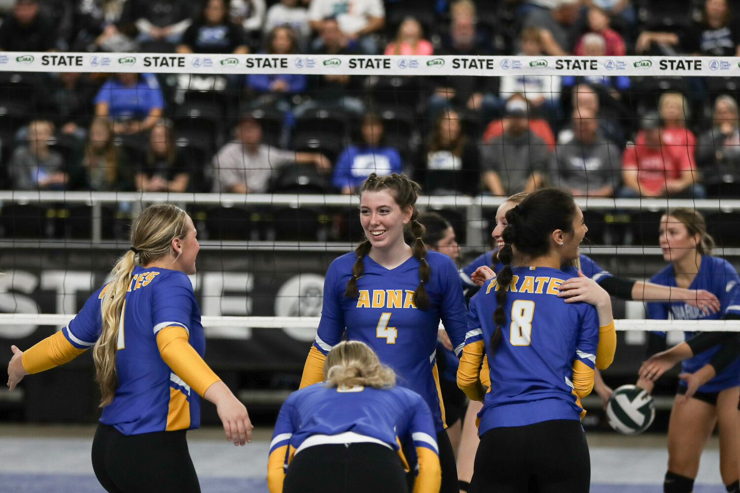 The Adna Pirates celebrate after defeating Warden in the first round of the state tournament on Nov,. 8 in Yakima.