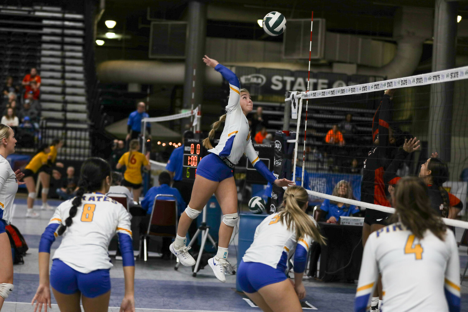 Danika Hallom spikes the ball during Adna's win over Liberty at the state tournament on Nov. 9 in Yakima.