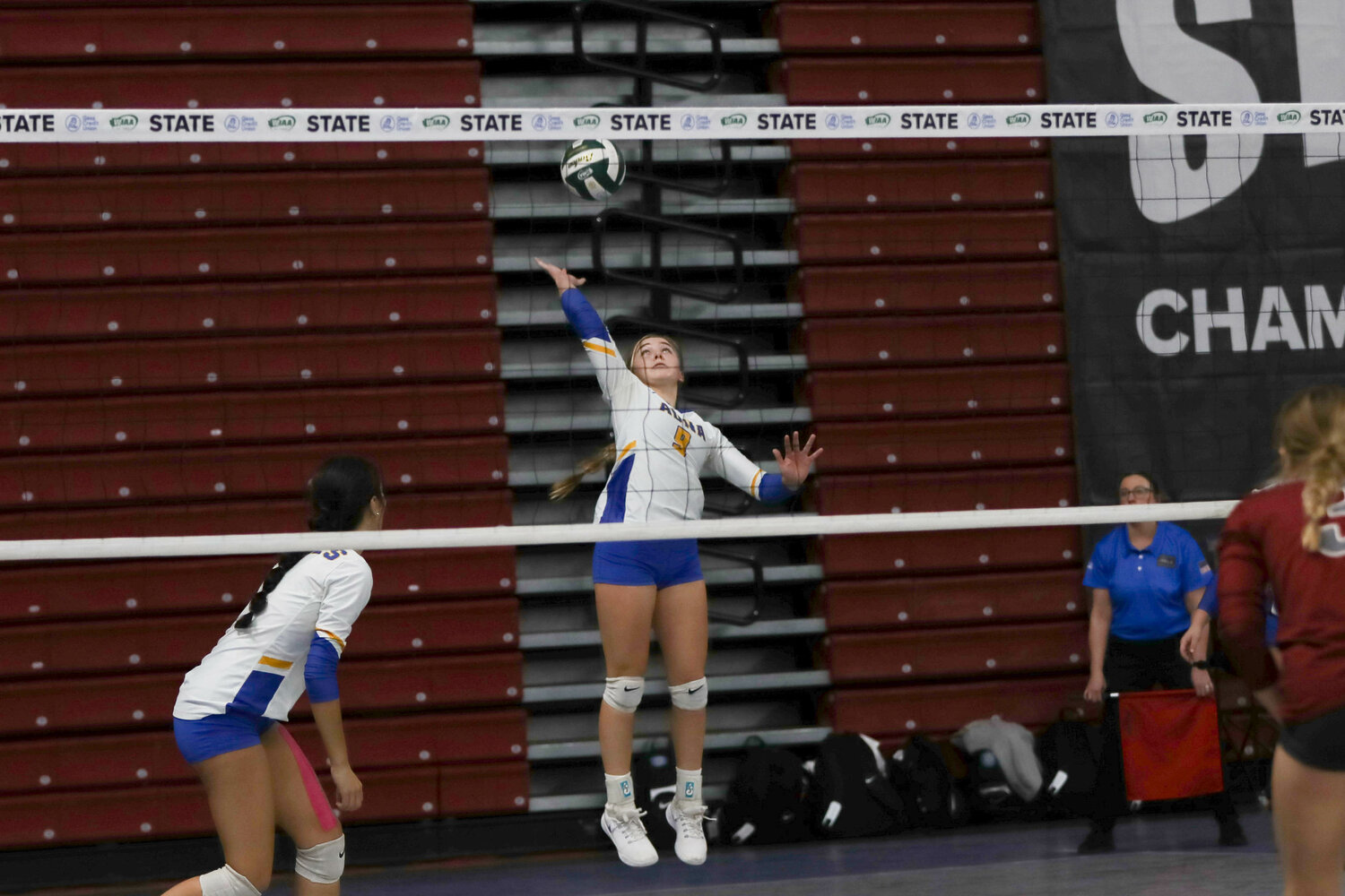 Danika Hallom hits the ball over the net during Adna's win over Okanogan in the fifth-place game at the state tournament on Nov. 9 in Yakima.