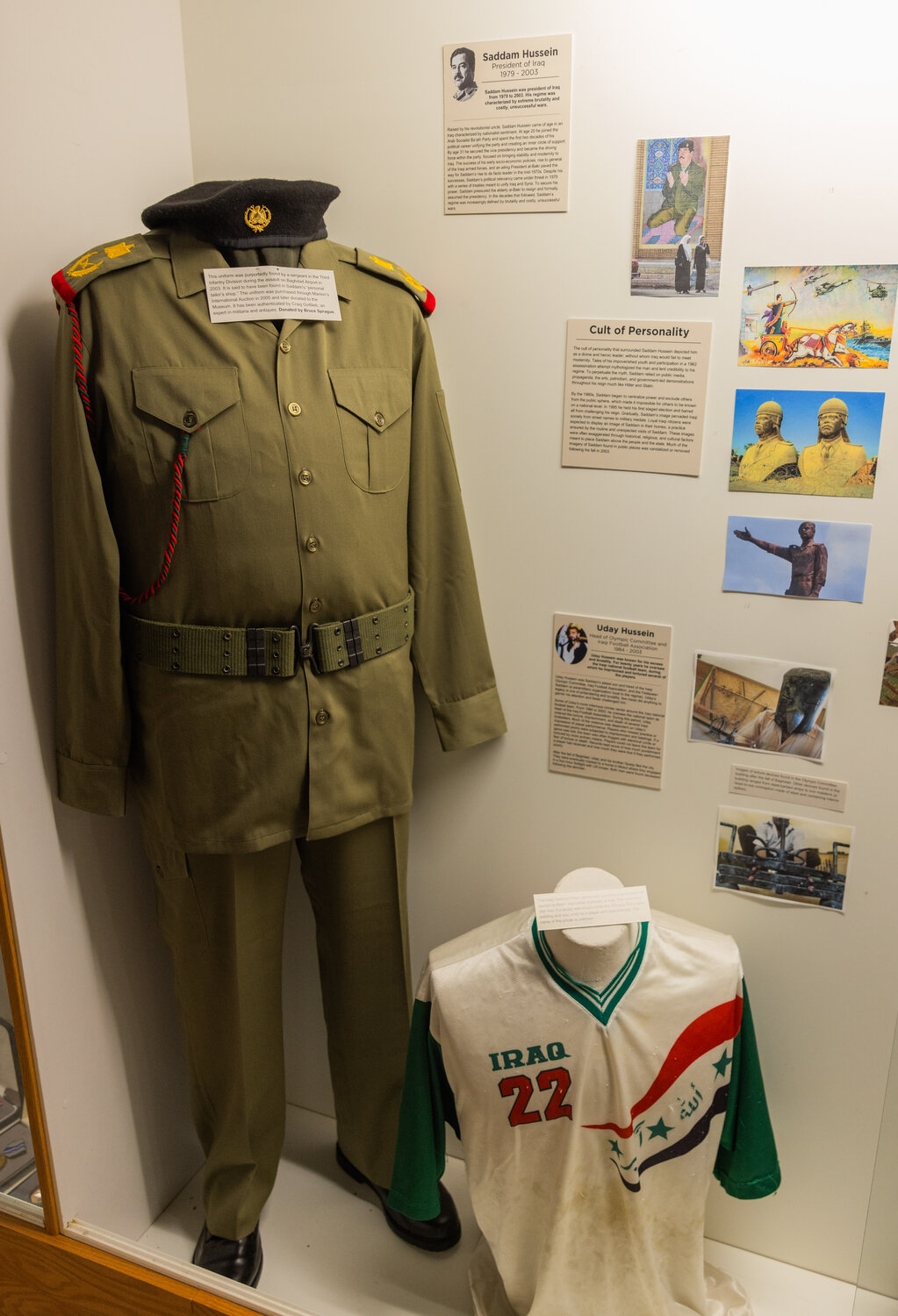 An authenticated outfit tailored for Saddam Hussein, one of three known to be in America, sits on display inside a case at the Veterans Memorial Museum in Chehalis on Tuesday, Nov. 14.