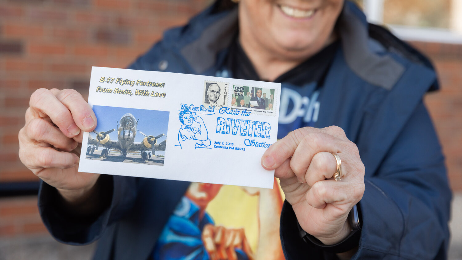 Envelopes featuring “Rosie The Riveter,” were handed out to attendees Thursday afternoon in Chehalis.