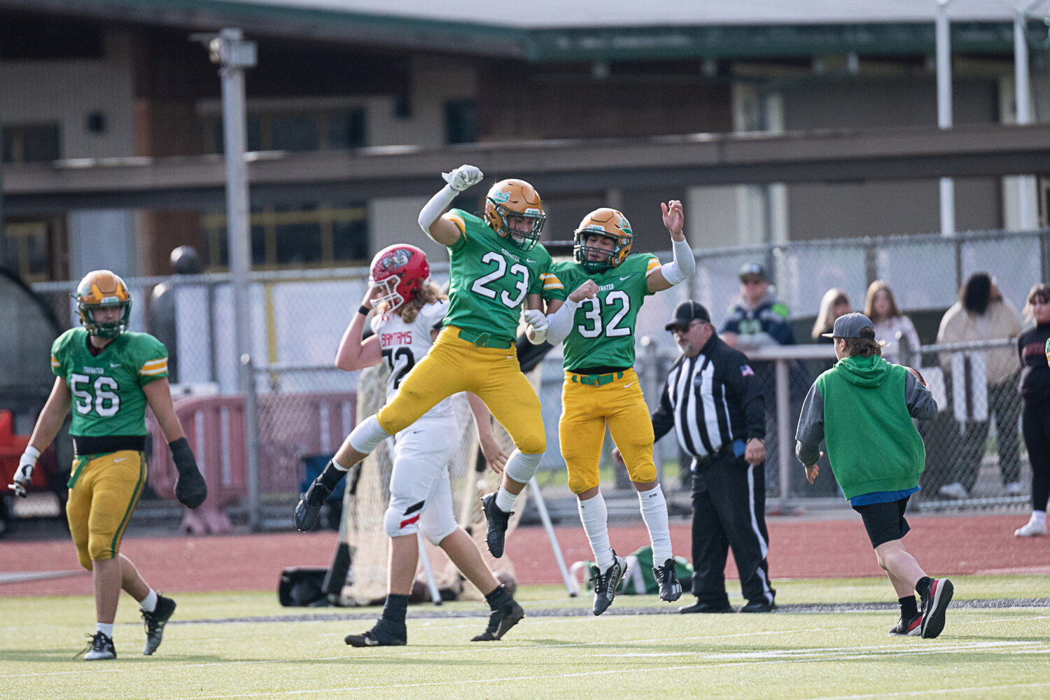 Cash Short (23) celebrates with Peyton Davis after intercepting a pass during Tumwater's 42-6 win over Clarkston in the 2A quarterfinals in Tumwater on Nov. 18.