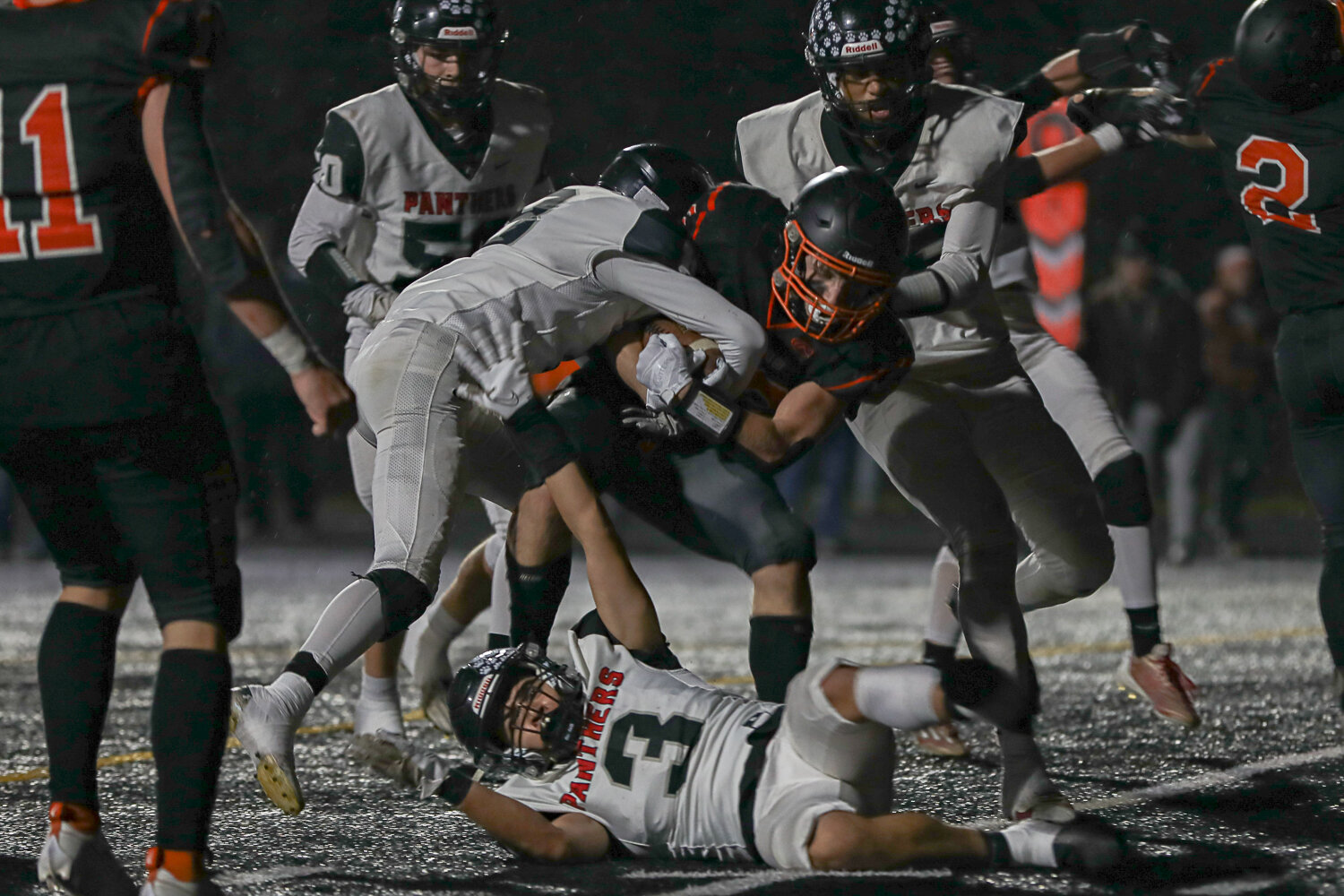 Cayle Kelly runs through defenders during a 43-14 Napavine win over River View on Nov. 18.