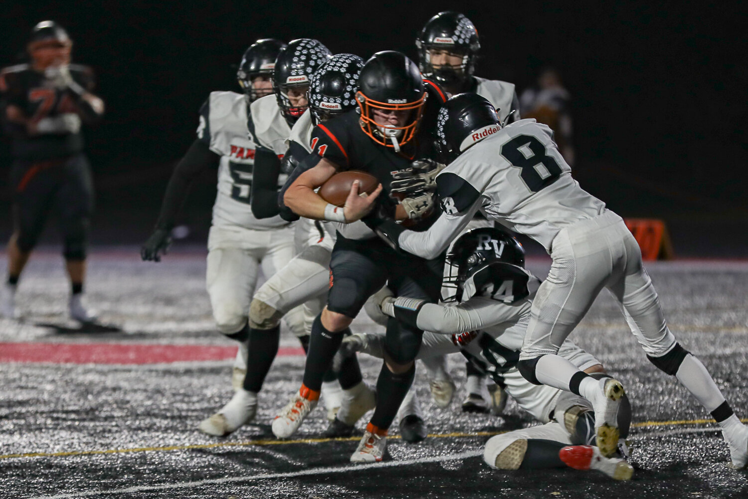 Colin Shields drags the River View secondary down field during a 43-14 Napavine win on Nov. 18.