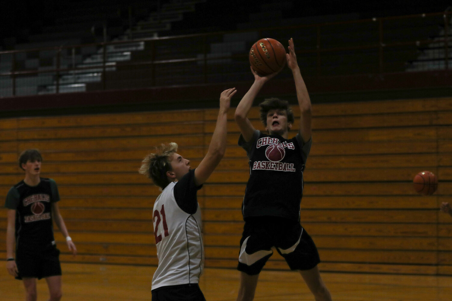 Trenton Schoepf shoots the ball over Weston Potter during W.F. West's practice on Nov. 21.